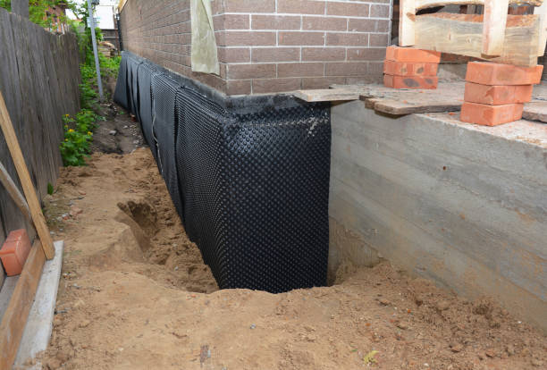 SJ Waterproofing Pros technician performing targeted Emergency Waterproofing assessment in Welcome, NC